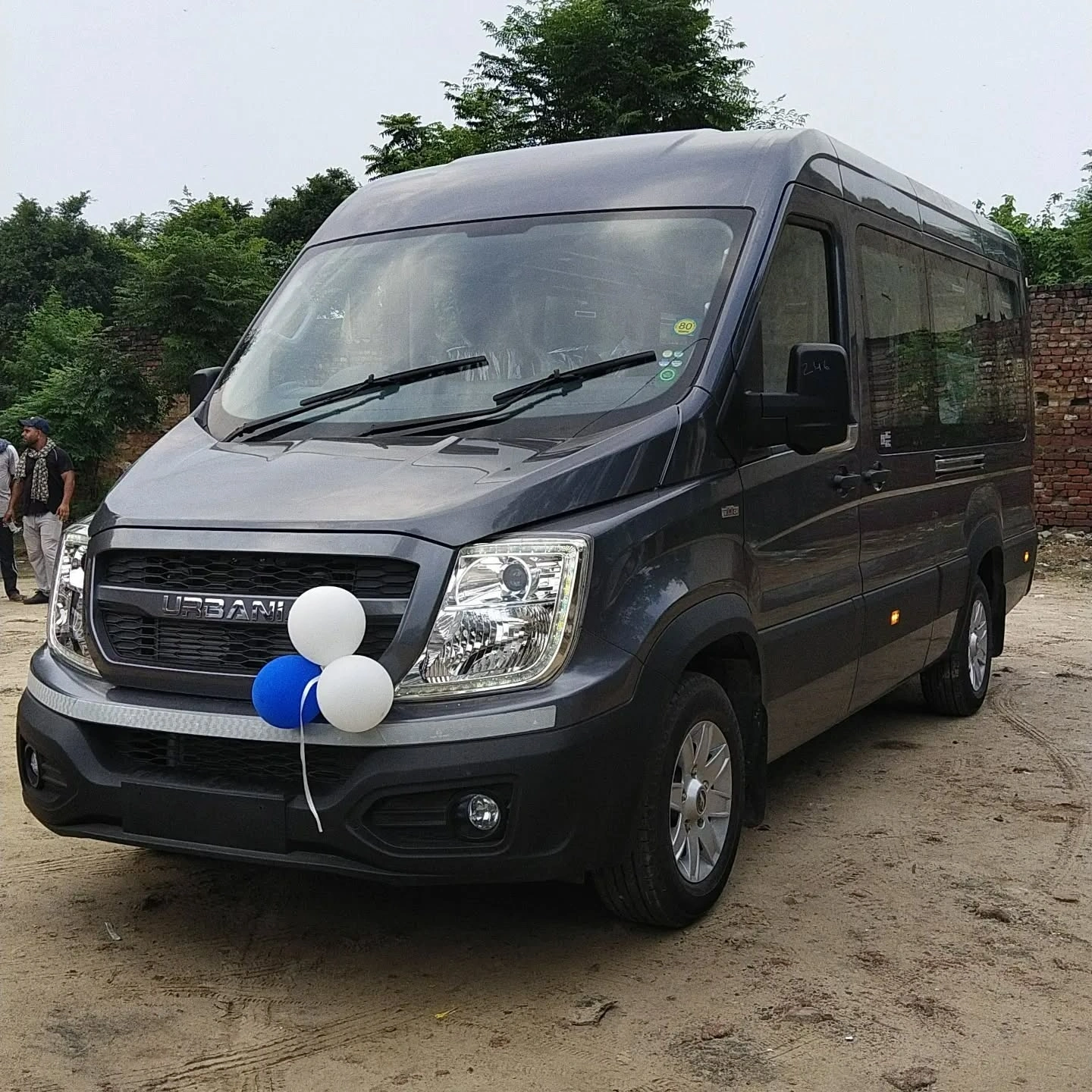 Comfortable Urbania tempo traveller for family and corporate trips